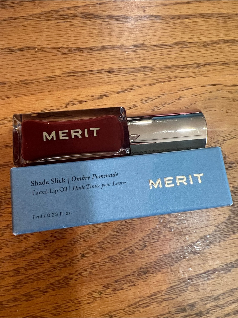 Merit Shade slick tinted lip oil sangria